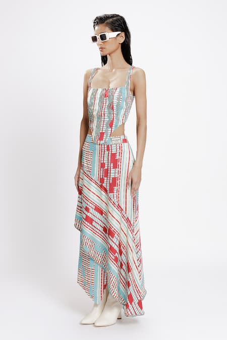 Shop Doh Tak Keh Red Bemberg Twill Satin Print Local Asymmetrical Skirt Online at Aza Fashions Shop_Doh Tak Keh_Red Bemberg Twill Satin Print Local Asymmetrical Skirt_Online_at_Aza_Fashions