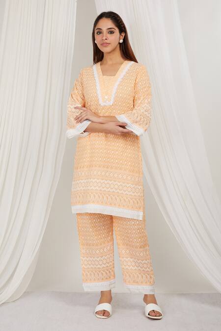 Shop Label Muslin Orange Cotton Embroidery Asymmetric Papaya Kurta With Pant Online at Aza Fashions Shop_Label Muslin_Orange Cotton Embroidery Asymmetric Papaya Kurta With Pant _Online_at_Aza_Fashions
