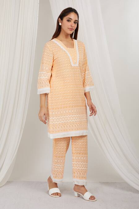 Label Muslin Orange Cotton Embroidery Asymmetric Papaya Kurta With Pant at Aza Fashions Label Muslin_Orange Cotton Embroidery Asymmetric Papaya Kurta With Pant _at_Aza_Fashions