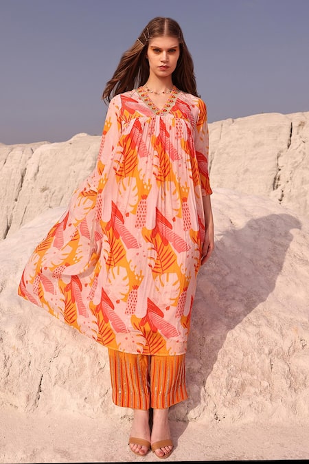 Shop Meher By Islie Pink Crepe, Cotton Embroidery V-neck Swiss Cheese Print Kurta And Pant Set at Aza Fashions Shop_Meher By Islie_Pink Crepe, Cotton Embroidery V-neck Swiss Cheese Print Kurta And Pant Set _at_Aza_Fashions