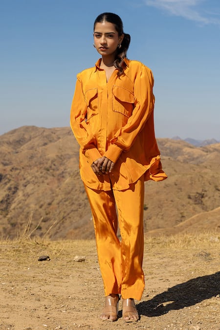 Shop Meher By Islie Orange Crepe Beads Embellished Shirt With Pockets at Aza Fashions Shop_Meher By Islie_Orange Crepe Beads Embellished Shirt With Pockets _at_Aza_Fashions