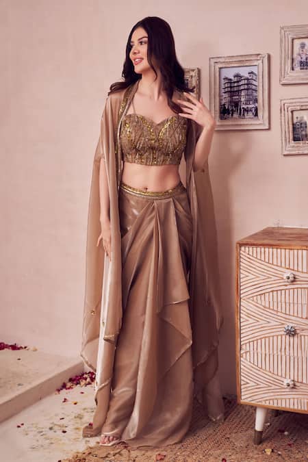 Swish By Dolcy And Simran_Gold Silk, Organza Sequins, Cut Allure Bloom Embroidered Cape Draped Skirt Set _Online_at_Aza_Fashions