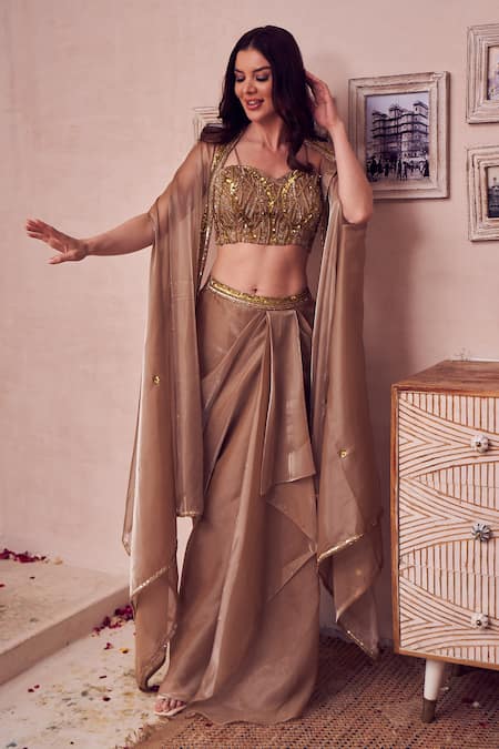Buy_Swish By Dolcy And Simran_Gold Silk, Organza Sequins, Cut Allure Bloom Embroidered Cape Draped Skirt Set _Online_at_Aza_Fashions