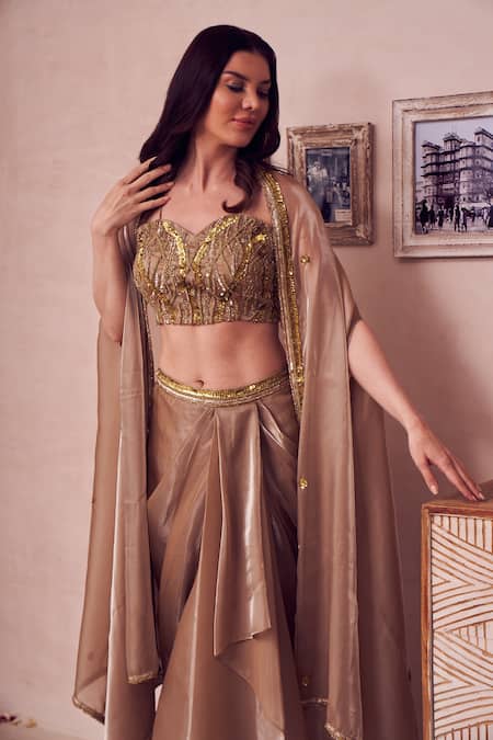 Shop_Swish By Dolcy And Simran_Gold Silk, Organza Sequins, Cut Allure Bloom Embroidered Cape Draped Skirt Set _Online_at_Aza_Fashions