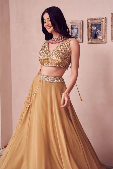Swish By Dolcy And Simran Gold Georgette Sequins, Marigold Layered Tassel Embellished Lehenga With Blouse Online at Aza Fashions Swish By Dolcy And Simran_Gold Georgette Sequins, Marigold Layered Tassel Embellished Lehenga With Blouse _Online_at_Aza_Fashions