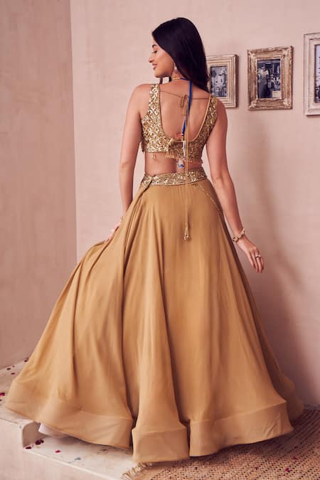 Shop Swish By Dolcy And Simran Gold Georgette Sequins, Marigold Layered Tassel Embellished Lehenga With Blouse at Aza Fashions Shop_Swish By Dolcy And Simran_Gold Georgette Sequins, Marigold Layered Tassel Embellished Lehenga With Blouse _at_Aza_Fashions