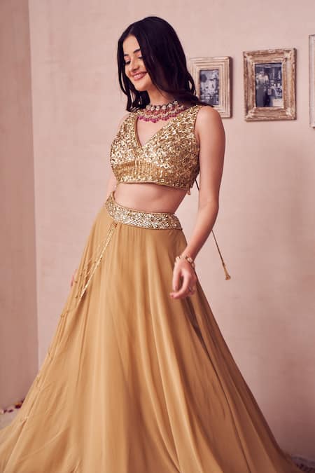 Shop Swish By Dolcy And Simran Gold Georgette Sequins, Marigold Layered Tassel Embellished Lehenga With Blouse Online at Aza Fashions Shop_Swish By Dolcy And Simran_Gold Georgette Sequins, Marigold Layered Tassel Embellished Lehenga With Blouse _Online_at_Aza_Fashions