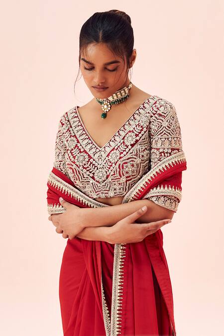 Bhumika Sharma_Red Georgette, Net Embroidery V-neck Hem Saree With Blouse _Online_at_Aza_Fashions