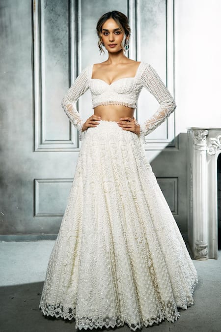 Isa By Dolly Wahal Ivory Net Hand Embroidery Sequins Sweetheart Ira Lehenga Set 