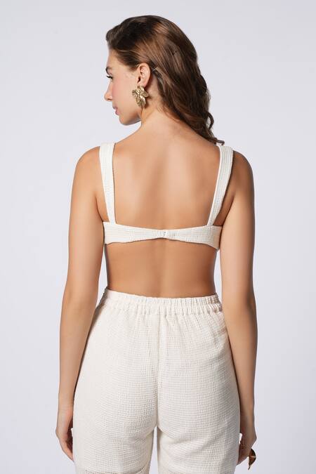 Shop Ekastories White Cotton Embroidery Luxe Dispersing Circle Mesh Bralette at Aza Fashions Shop_Ekastories_White Cotton Embroidery Luxe Dispersing Circle Mesh Bralette_at_Aza_Fashions