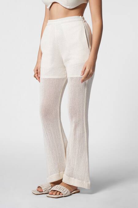 Ekastories White Cotton Luxe Mesh Leisure Bootcut Pant Online at Aza Fashions Ekastories_White Cotton Luxe Mesh Leisure Bootcut Pant_Online_at_Aza_Fashions