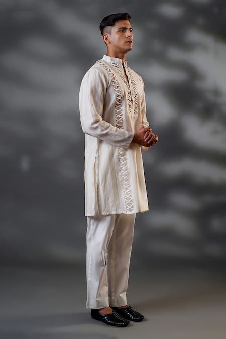 Menero_Ivory Chanderi Silk, Cotton Embroidery Criss Cross Work Kurta And Pant Set _at_Aza_Fashions