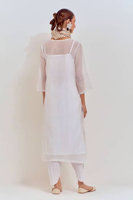 Shop Shikha Malik White Silk, Chanderi Pom-poms Round Neck Front Gather Kurta Striped Dhoti Pant at Aza Fashions Shop_Shikha Malik_White Silk, Chanderi Pom-poms Round Neck Front Gather Kurta Striped Dhoti Pant _at_Aza_Fashions
