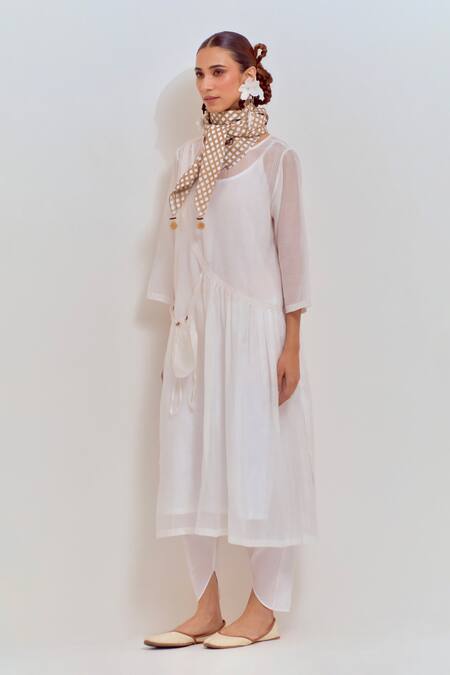 Shop Shikha Malik White Silk, Chanderi Pom-poms Round Neck Front Gather Kurta Striped Dhoti Pant Online at Aza Fashions Shop_Shikha Malik_White Silk, Chanderi Pom-poms Round Neck Front Gather Kurta Striped Dhoti Pant _Online_at_Aza_Fashions