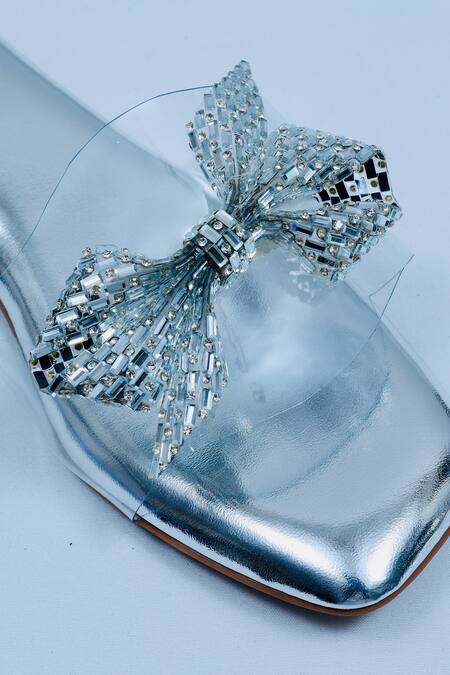 Shop Sana K luxurious Footwear Silver Bow Strap Embellished Flats Online at Aza Fashions Shop_Sana K luxurious Footwear_Silver Bow Strap Embellished Flats _Online_at_Aza_Fashions