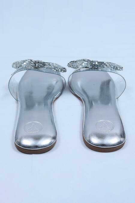 Sana K luxurious Footwear Silver Bow Strap Embellished Flats at Aza Fashions Sana K luxurious Footwear_Silver Bow Strap Embellished Flats _at_Aza_Fashions