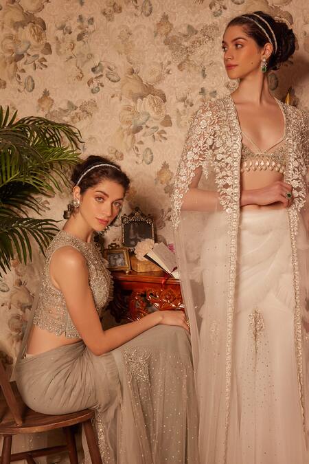 Buy_Cherie D_Ivory Silk, Tulle Embroidery, Sequins, Pearls Secret Bella Cape And Lehenga Set _Online_at_Aza_Fashions