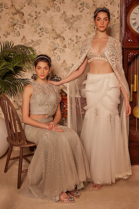 Shop_Cherie D_Ivory Silk, Tulle Embroidery, Sequins, Pearls Secret Bella Cape And Lehenga Set _Online_at_Aza_Fashions