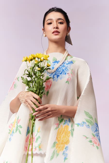 Moh India_Ivory Poly Satin Embroidery Cross-stitch Rose Asymmetric Neck Summer Cape _at_Aza_Fashions