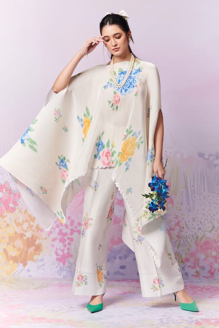 Moh India Ivory Ply Satin Cape Embroidery Cross-stitch Rose Summer With Trouser at Aza Fashions Moh India_Ivory Ply Satin Cape Embroidery Cross-stitch Rose Summer With Trouser _at_Aza_Fashions