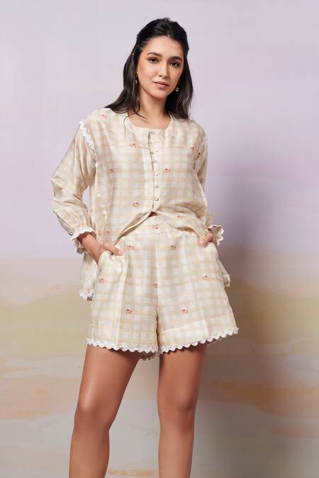 Shop Moh India Ivory Chanderi, Cotton After Glow Rosette Shorts at Aza Fashions Shop_Moh India_Ivory Chanderi, Cotton After Glow Rosette Shorts _at_Aza_Fashions
