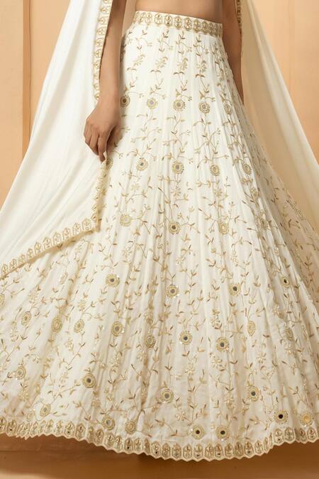 Quench A Thirst_Ivory Modal, Satin Mirrors, Pearls, Beads V-neck Embellished Lehenga Set _Online_at_Aza_Fashions