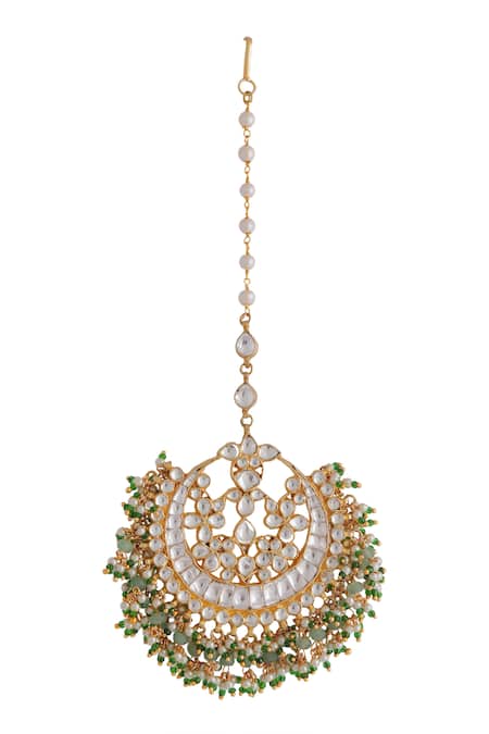 Shop Riana Jewellery Green Jadtar Stone Embellished Carved Maangtikka at Aza Fashions Shop_Riana Jewellery_Green Jadtar Stone Embellished Carved Maangtikka _at_Aza_Fashions