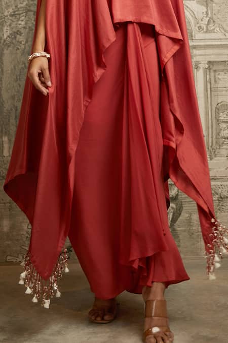 Prisho Coral Silk, Tissue Pearls, Lampi Embroidered Tasselled Kaftan With Draped Skirt Online at Aza Fashions Prisho_Coral Silk, Tissue Pearls, Lampi Embroidered Tasselled Kaftan With Draped Skirt _Online_at_Aza_Fashions