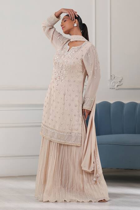 Raj Arora Beige Georgette Cut Work, Pearls, Sequins, Embroidery Split Kurta Sharara Set at Aza Fashions Raj Arora_Beige Georgette Cut Work, Pearls, Sequins, Embroidery Split Kurta Sharara Set _at_Aza_Fashions