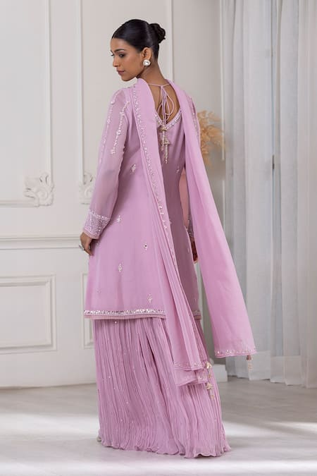 Shop Raj Arora Purple Georgette Cut Work, Pearls, Cutdana And Embroidered Kurta Sharara Set at Aza Fashions Shop_Raj Arora_Purple Georgette Cut Work, Pearls, Cutdana And Embroidered Kurta Sharara Set _at_Aza_Fashions