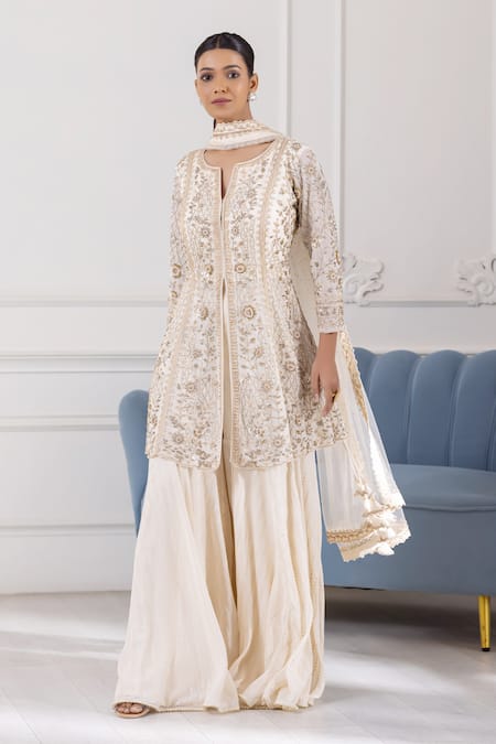 Raj Arora Ivory Georgette Cut Work, Sequins, Pearls Floral Embroidered Kurta Sharara Set at Aza Fashions Raj Arora_Ivory Georgette Cut Work, Sequins, Pearls Floral Embroidered Kurta Sharara Set _at_Aza_Fashions
