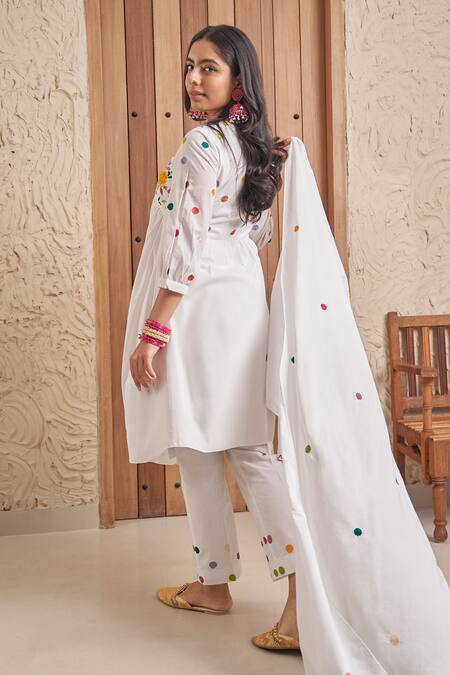 Shop_Samatvam By Anjali Bhaskar_Ivory Cotton, Muslin Tassels, Adila Floral Embroidered Yoke Kurta And Pant Set _Online_at_Aza_Fashions