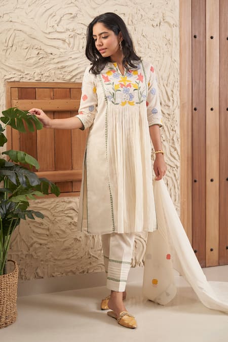 Samatvam By Anjali Bhaskar_Beige Cotton Lace, Tassels, Embroidery Bella Floral Applique Kurta And Pant Set _at_Aza_Fashions