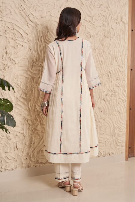 Shop Samatvam By Anjali Bhaskar Ivory Muslin, Cotton Tassels, Embroidery Idhi Thread Gathered Kurta And Pant Set at Aza Fashions Shop_Samatvam By Anjali Bhaskar_Ivory Muslin, Cotton Tassels, Embroidery Idhi Thread Gathered Kurta And Pant Set _at_Aza_Fashions