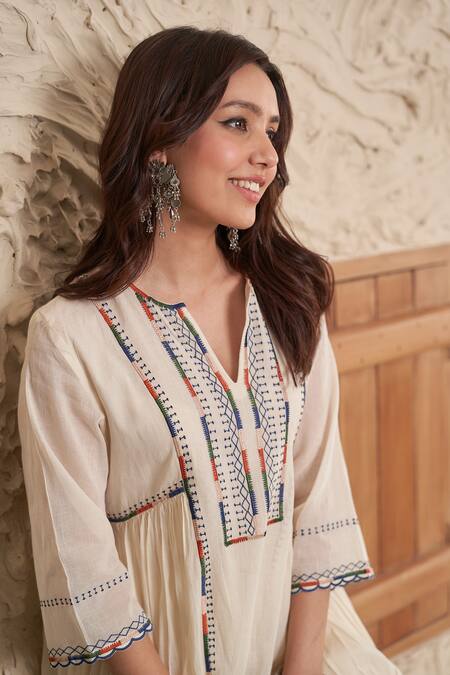 Buy Samatvam By Anjali Bhaskar Ivory Muslin, Cotton Tassels, Embroidery Idhi Thread Gathered Kurta And Pant Set Online at Aza Fashions Buy_Samatvam By Anjali Bhaskar_Ivory Muslin, Cotton Tassels, Embroidery Idhi Thread Gathered Kurta And Pant Set _Online_at_Aza_Fashions