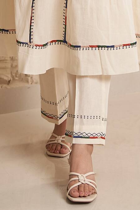 Shop Samatvam By Anjali Bhaskar Ivory Muslin, Cotton Tassels, Embroidery Idhi Thread Gathered Kurta And Pant Set Online at Aza Fashions Shop_Samatvam By Anjali Bhaskar_Ivory Muslin, Cotton Tassels, Embroidery Idhi Thread Gathered Kurta And Pant Set _Online_at_Aza_Fashions