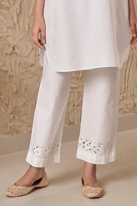 Buy_Samatvam By Anjali Bhaskar_Ivory Cotton Embroidery, Cut Work Round Navya Floral Thread Kurta With Pant _Online_at_Aza_Fashions