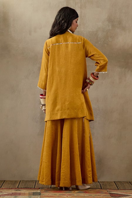 Shop Aseem Kapoor Yellow Crepe, Silk Tassels, Beads Round Neck Mitra Embroidered Kurta Trouser Set at Aza Fashions Shop_Aseem Kapoor_Yellow Crepe, Silk Tassels, Beads Round Neck Mitra Embroidered Kurta Trouser Set _at_Aza_Fashions