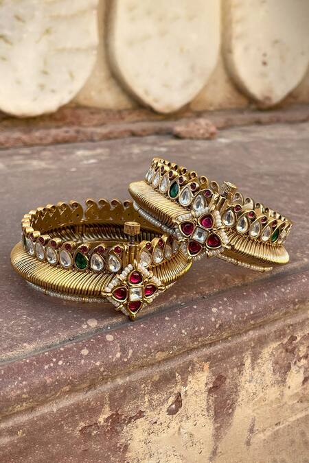 Saga Jewels Gold Plated Pearls, Gota Rajwadi Kundan Embellished Carved Kadas - Set Of 2 Online at Aza Fashions Saga Jewels_Gold Plated Pearls, Gota Rajwadi Kundan Embellished Carved Kadas - Set Of 2 _Online_at_Aza_Fashions