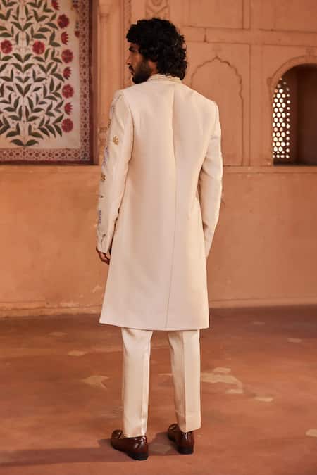 Shop Contrast By Parth Ivory Silk Cut Work, Zari, Diamonds, Embroidery Jahaan Embellished Sherwani Set at Aza Fashions Shop_Contrast By Parth_Ivory Silk Cut Work, Zari, Diamonds, Embroidery Jahaan Embellished Sherwani Set _at_Aza_Fashions