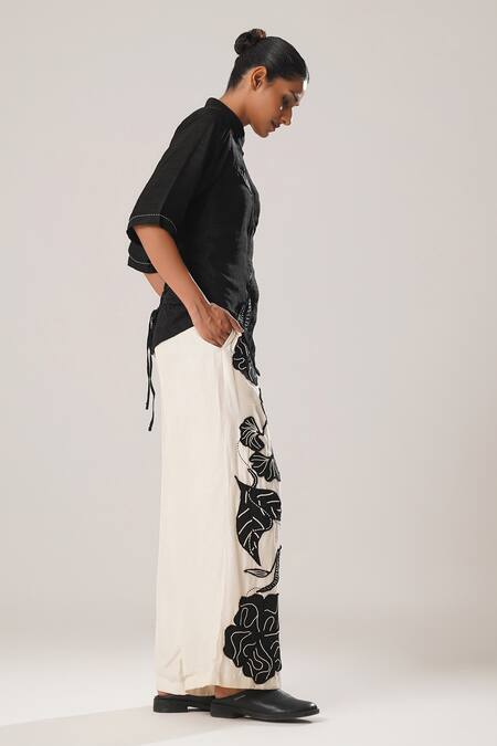 Buy_Atbw_White Silk Satin Fabric Flowers Detailed Flared Pant _Online_at_Aza_Fashions