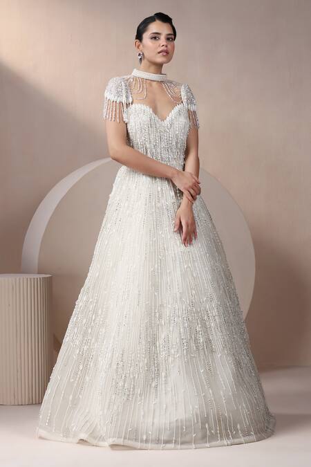 Chaashni By Maansi And Ketan_Off White Net Sequins Sweetheart Neck Embellished Gown With Cape _at_Aza_Fashions