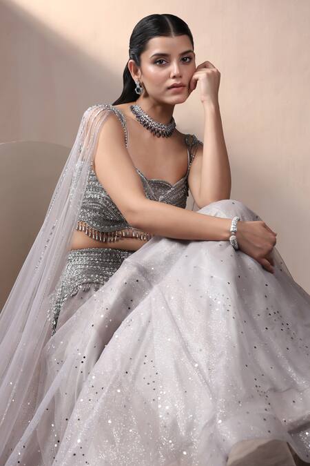 Chaashni By Maansi And Ketan_Grey Net Stones, Cut Work, Embroidery Plunge Neck Sequin Lehenga With Blouse_at_Aza_Fashions