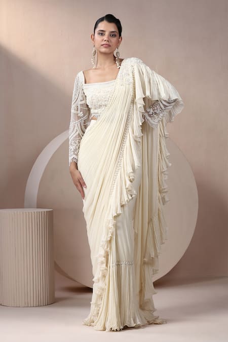 Chaashni by Maansi and Ketan Ivory Georgette Embroidered Pearl Ruffle Detailed Pre-draped Saree With Blouse 