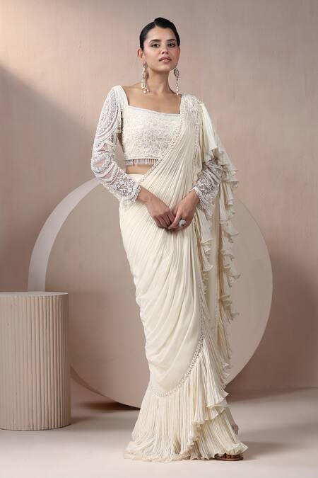 Chaashni By Maansi And Ketan_Ivory Georgette, Net Beads, Ruffle Detailed Pre-draped Saree With Blouse _at_Aza_Fashions