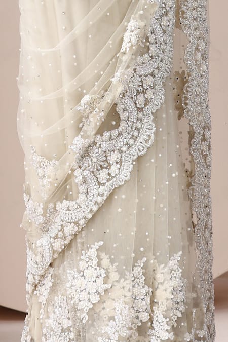 Shop_Chaashni By Maansi And Ketan_Off White Net Sequins, Pearls Plunge Embroidered Scallop Hem Saree With Blouse _Online_at_Aza_Fashions