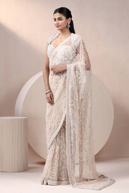 Chaashni By Maansi And Ketan_Beige Net Pearls, Sequins, Beads Sweetheart Neck Embroidered Saree With Blouse _at_Aza_Fashions