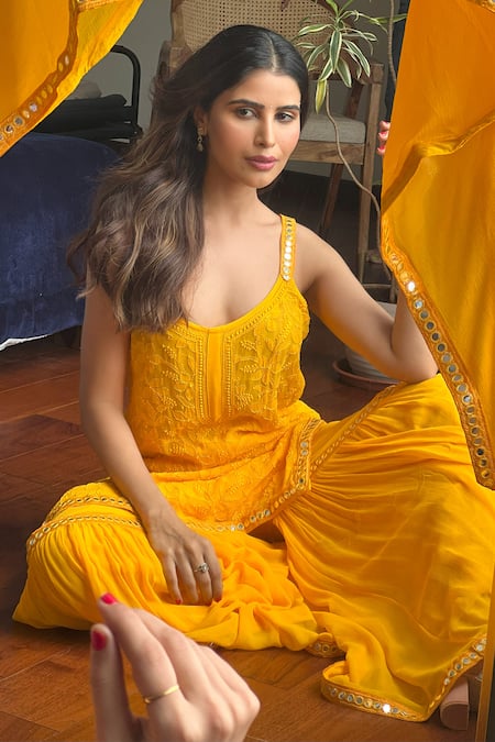 LABEL AISHWARYRIKA Yellow Georgette Mirrors Scoop Neck Chikankari And Work Kurta Set at Aza Fashions LABEL AISHWARYRIKA_Yellow Georgette Mirrors Scoop Neck Chikankari And Work Kurta Set _at_Aza_Fashions