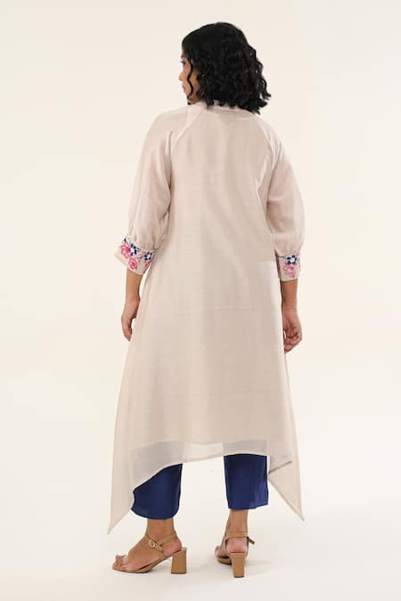 Shop Origani Off White Chanderi Silk, Cotton Iris Bloom Applique Asymmetric Kurta With Pant at Aza Fashions Shop_Origani_Off White Chanderi Silk, Cotton Iris Bloom Applique Asymmetric Kurta With Pant _at_Aza_Fashions