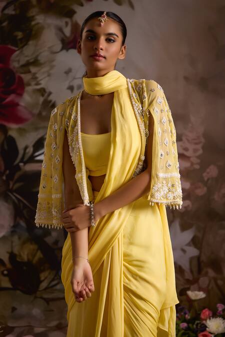 Buy_Saniya Sharma_Yellow Chiffon, Net Scoop Neck Pre-draped Saree Set With Bead Embellished Cape _Online_at_Aza_Fashions